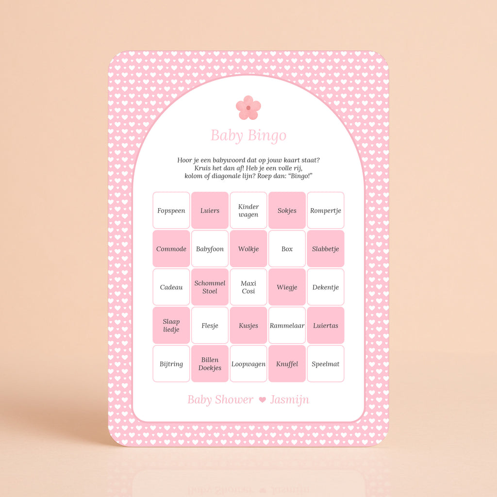 Baby Bingo kaart met witte hartjes op roze achtergrond en bloemaccent, gepersonaliseerd met naam – Studio Miron