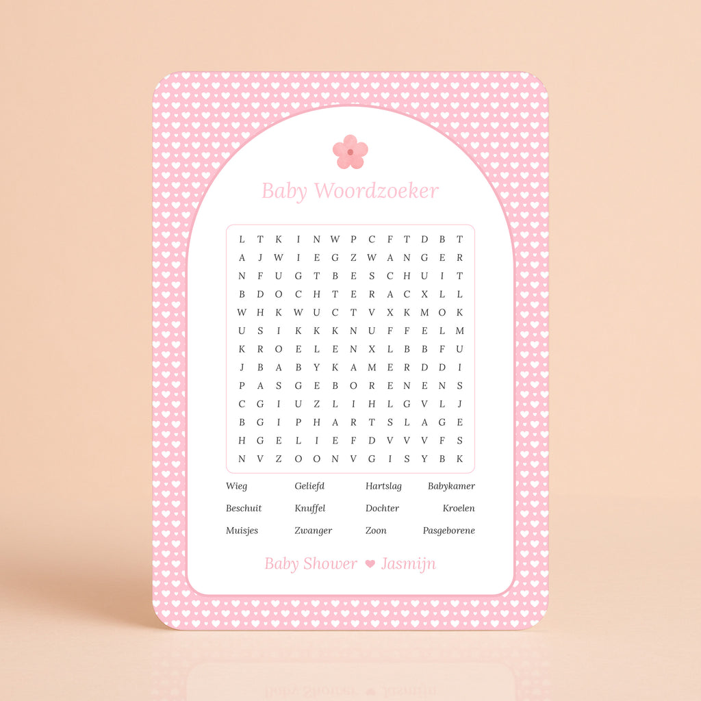 Baby Woordzoeker kaart met witte hartjes op roze achtergrond en bloemaccent, gepersonaliseerd met naam – Studio Miron
